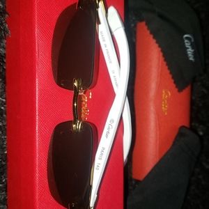 Cartier Sunglasses - white buffs
